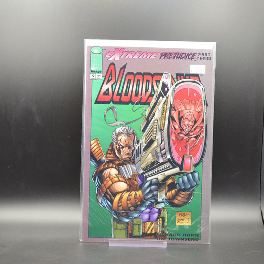 BLOODSTRIKE #9 - 2 Geeks Comics