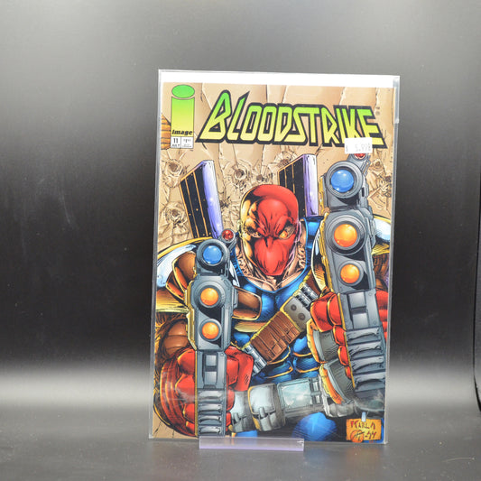 BLOODSTRIKE #11 - 2 Geeks Comics